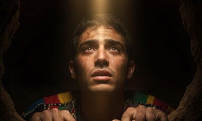 Capturing Joseph's moment of affliction in the dark pit, his face lifted toward heaven's light.Featured Image Description: Vintage expensive large format camera photograph from biblical times showing extreme close-up of young Joseph's tear-streaked face in the dark pit. His hands grip the dirt walls as a single beam of heavenly light illuminates his upward-looking eyes. Dirt marks his face, remnants of his coat of many colours visible at his shoulder. The image captures anguished trust and suffering faith with authentic period photographic quality, dramatic chiaroscuro lighting, and deep shadows. Pure visual storytelling with no text.Featured Image Title: Joseph in the Pit - Vintage Biblical Affliction Photograph