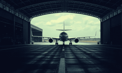 Abstract representation of aircraft manufacturing in Nigeria, focusing on the industry's challenges and the country's transportation priorities.