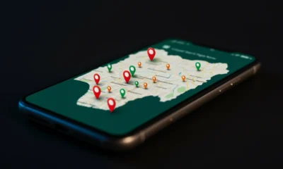 A smartphone showing high activity for Local search terms across a map of Nigeria