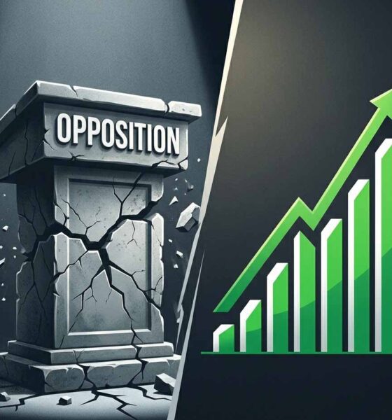 Stone podium labeled OPPOSITION crumbling next to rising green chart.