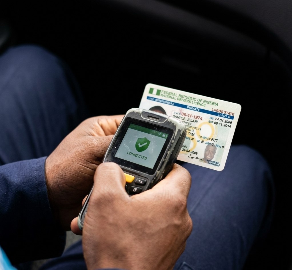 FRSC and NIMC officials at data integration agreement signing ceremony showing laptop and documentsFeatured Image Description:
Digital photograph of Federal Road Safety Corps and National Identity Management Commission representatives seated at a conference table during the official memorandum of understanding signing for data integration. Both agencies' logos visible on backdrop. Documents and laptops on table. Date stamp indicates first quarter 2026.Featured Image Title:
frsc-nimc-data-integration-agreement-signing-2026.jpg