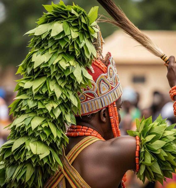 Owo festival chief leaf headdress performing ritual dance.