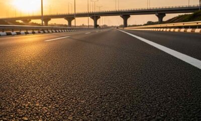 A newly paved road under construction in Asaba, Nigeria, during golden hour.