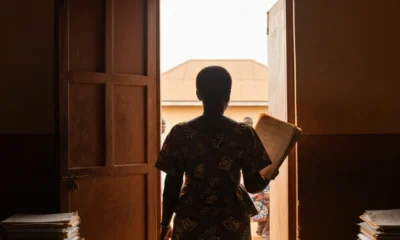 Woman at population commission office.