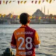 Boy in Osimhen jersey looks at Bosphorus.