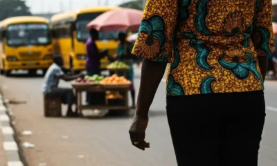 Woman by road, Lagos, Nigeria.